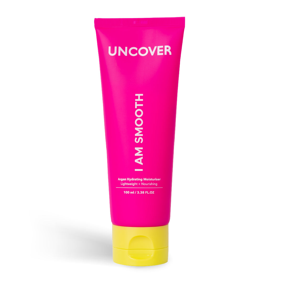 Uncover Argan Hydrating Moisturiser 120ml pink squeeze bottle with yellow cap at Bracketts Beauty